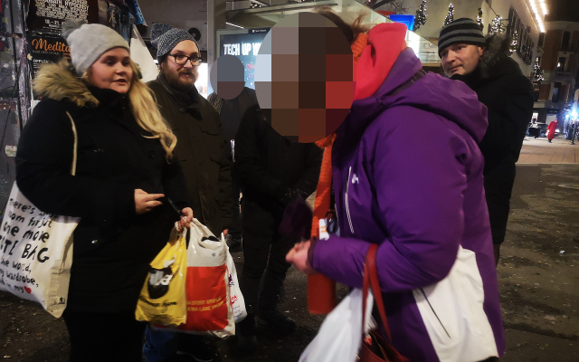 Nordic Resistance Movement activists give supplies to the homeless in Oslo