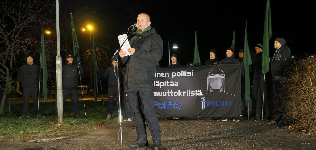 Simon Lindberg holds a speech at the 2018 Finnish Independence Day National Socialist march