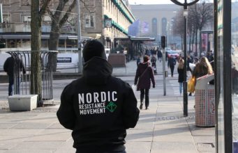 A Nordic Resistance Movement activist leaflets in Gothenburg