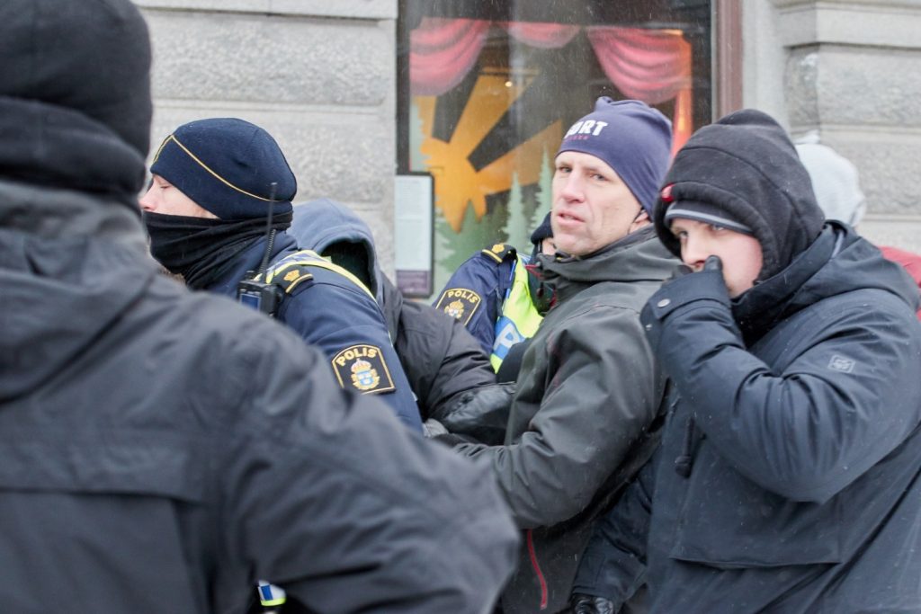 Undercover police arrest a young man for thought crime at a freedom of speech demonstration in Stockholm