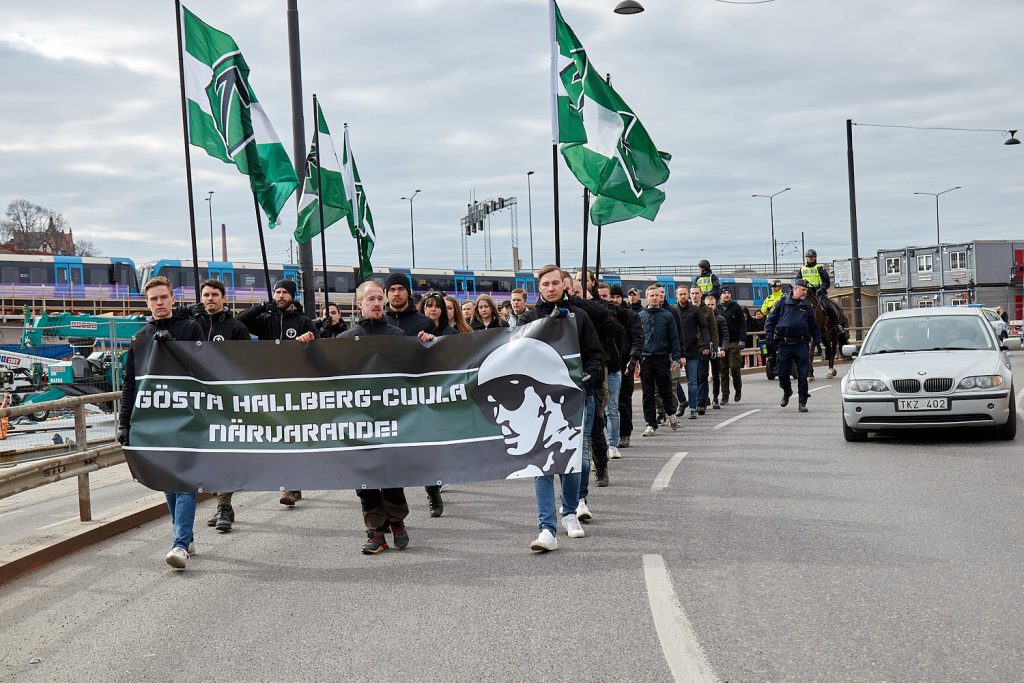 Nordic Resistance Movement members honour the memory of Gösta Hallberg-Cuula in Stockholm, 2019