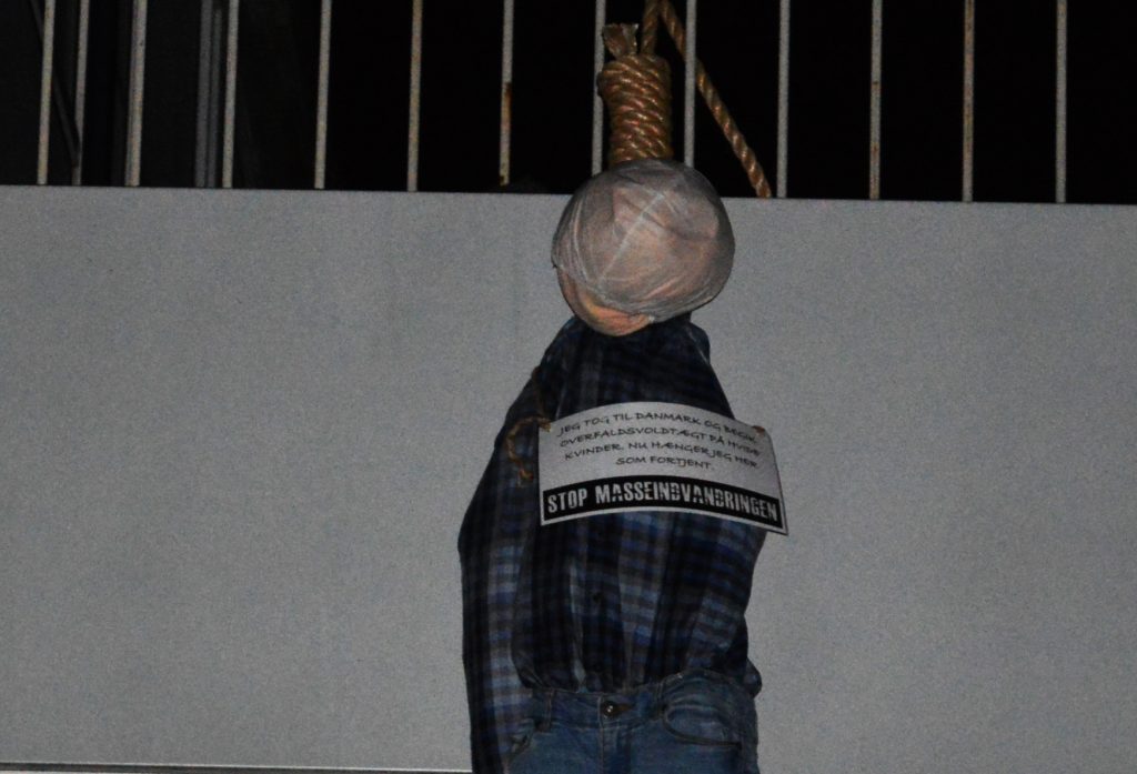 National Socialist activists in Randers hang a doll as a symbolic protest against rape culture in Denmark