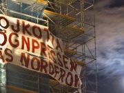 Nordic Resistance Movement banner on Dagens Nyheter Tower, Stockholm