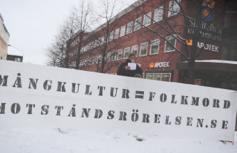 "Multiculturalism = Genocide" NRM banner in Skellefteå, Sweden
