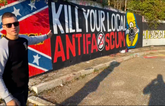 Rob Rundo with Antifa banner