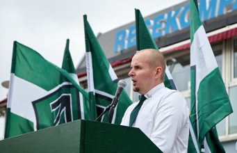 Simon Lindberg gives a speech at Nordic Resistance Movement demonstration