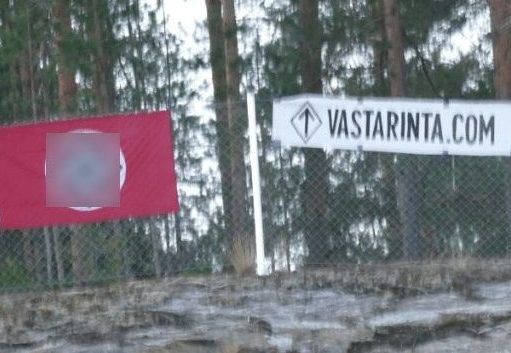 Swastika flag and Vastarinta banner, Finland