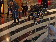 Nordic Resistance Movement confetti action in the Mall of Scandinavia, Stockholm, Sweden