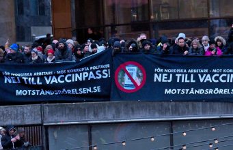 Nordic Resistance Movement banners at vaccine passport demonstration in Stockholm