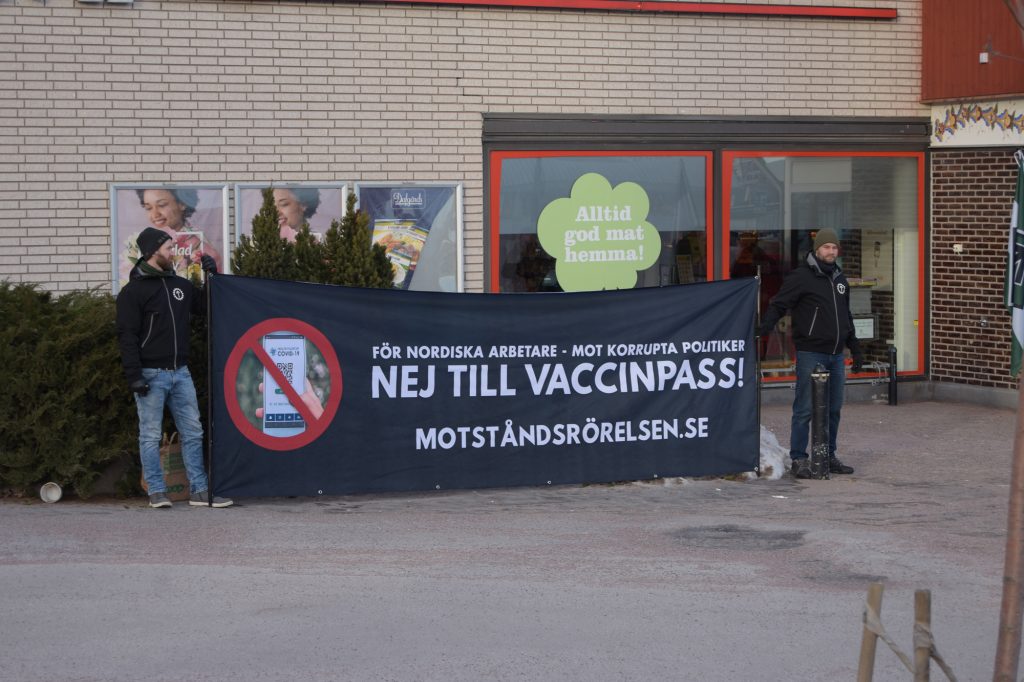 Nordic Resistance Movement vaccine passport banner, Hedemora, Sweden