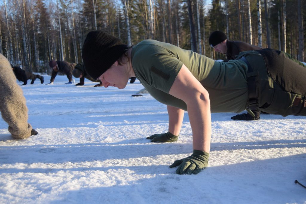 Push-ups on frozen Lake Rämen, Dalarna, Sweden