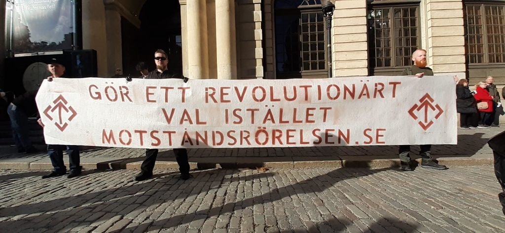 Nordic Resistance Movement banner at Alternative for Sweden rally, Stockholm