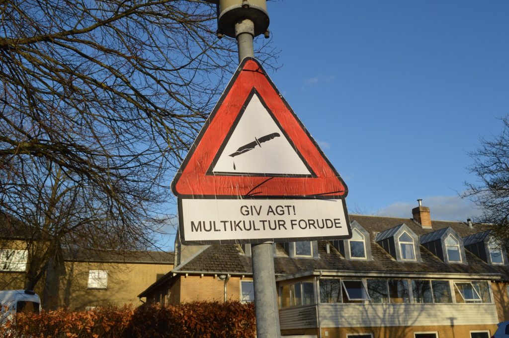 Warning: Multiculturalism Ahead sign in Sandvad, Denmark