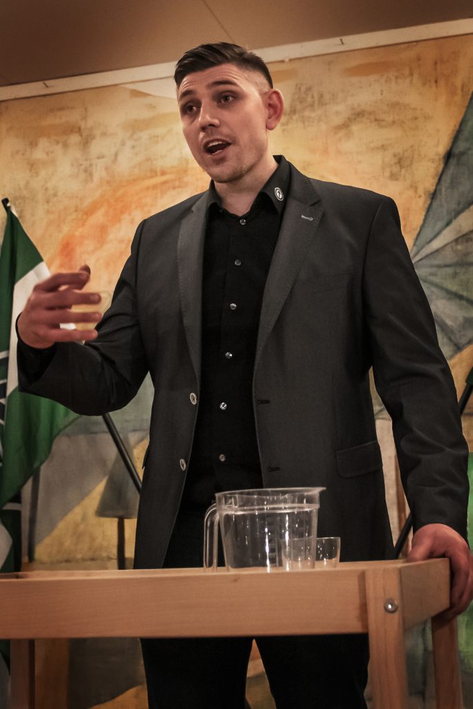 Martin Engelin gives a speech at the Nordic Resistance Movement 25th anniversary celebration