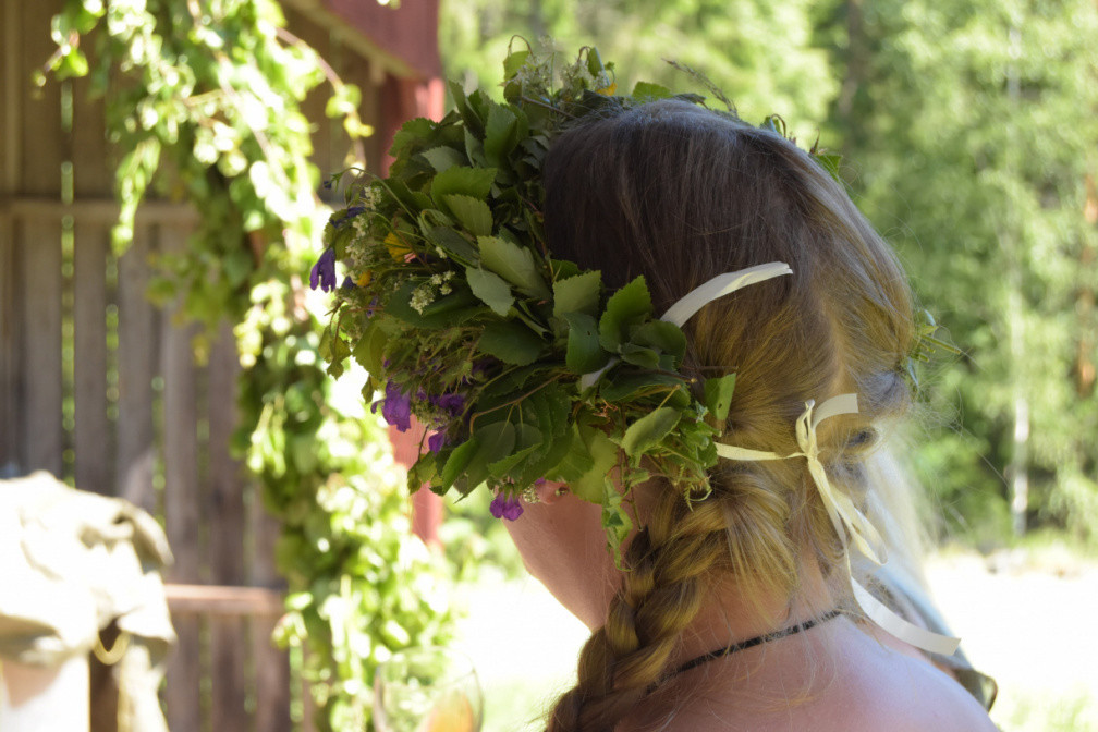 Swedish woman wearing wreath at Midsummer
