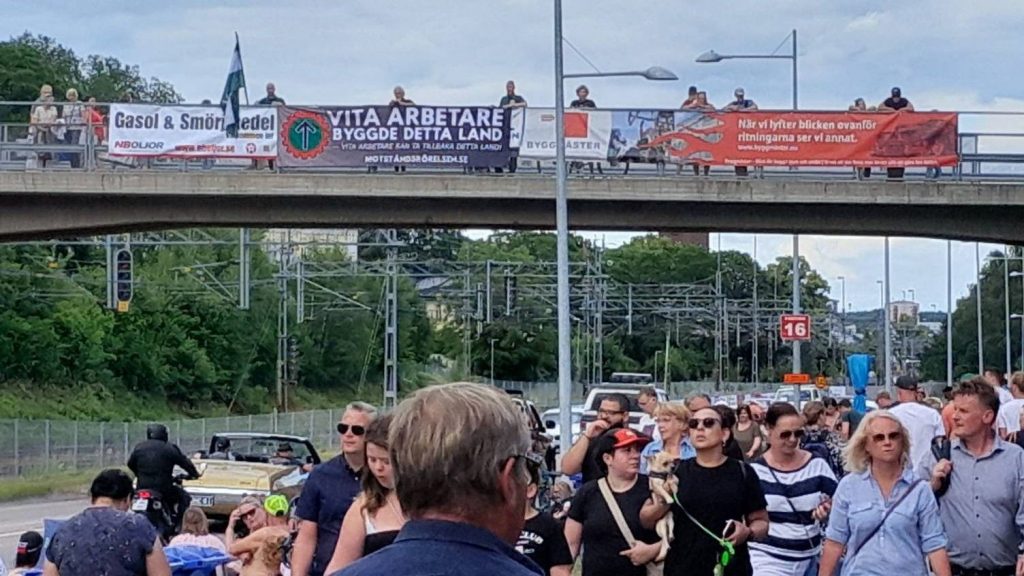 Nordic Resistance Movement banner at Summer Meet Västerås car show, Sweden