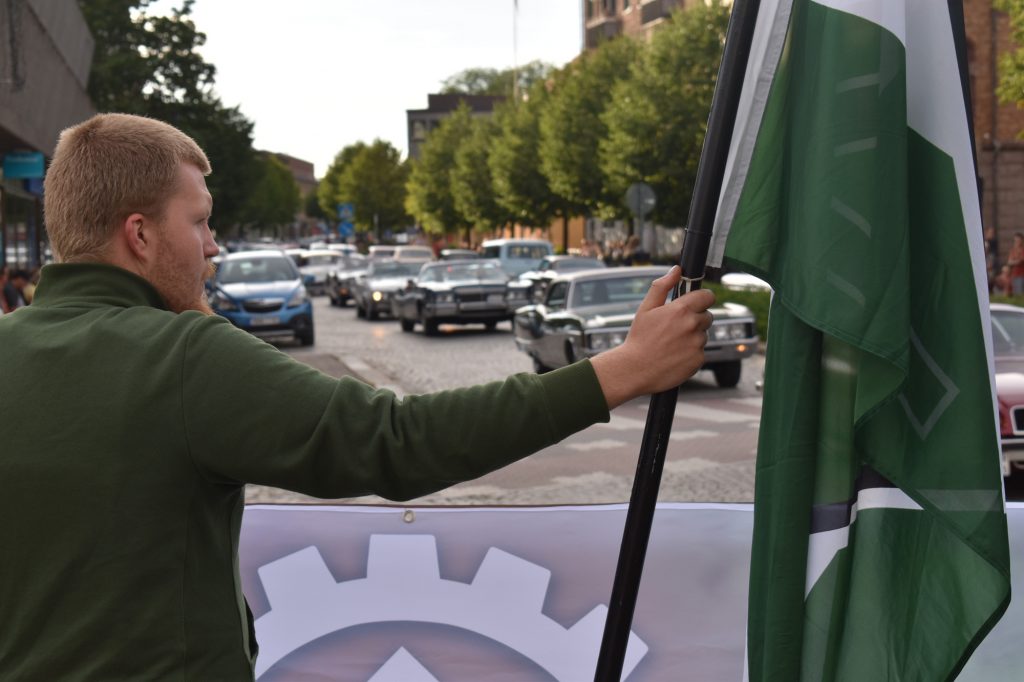 Nordic Resistance Movement activist at car cruising event in Vetlanda, Sweden