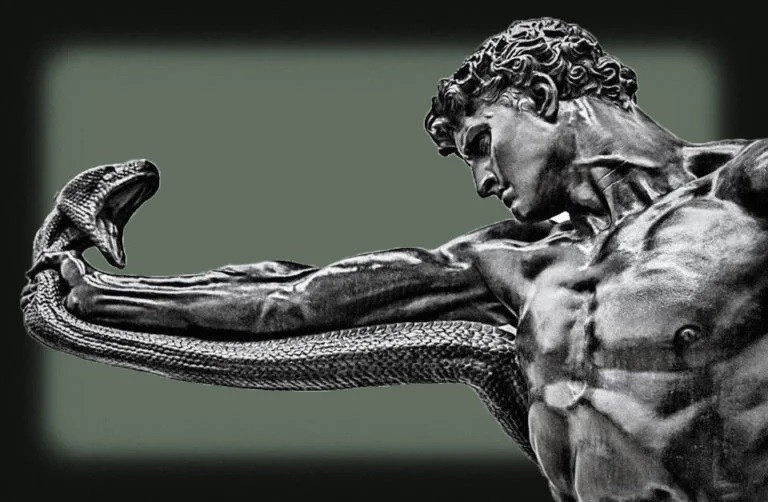 Man wrestling snake statue