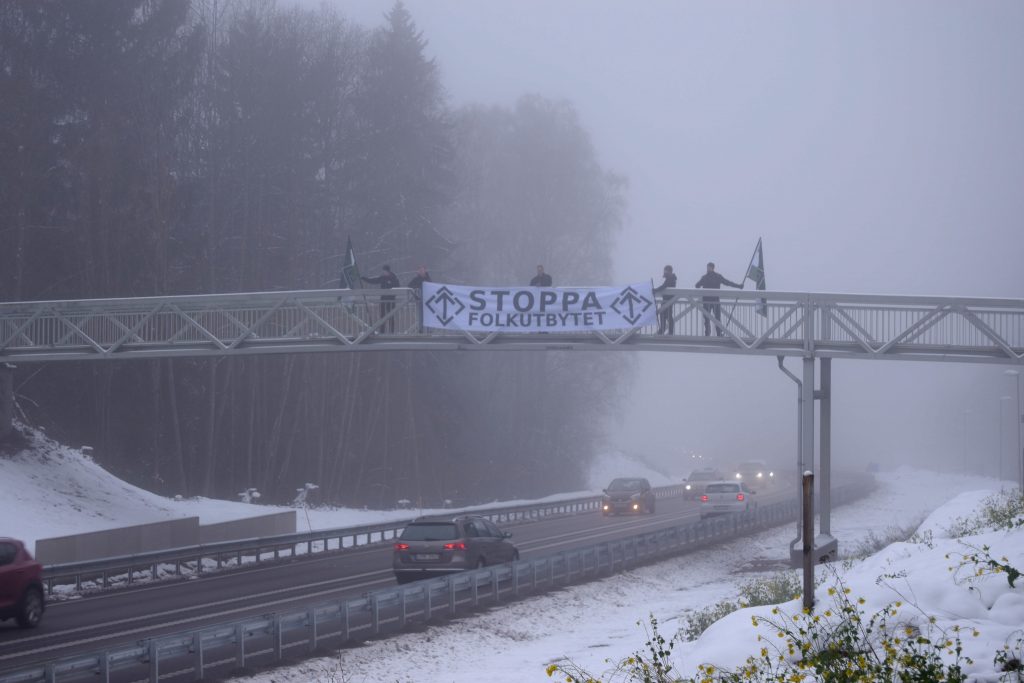 Nordic Resistance Movement "Stop the Population Replacement" banner action, Borlänge, Sweden