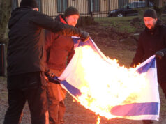 Nordic Resistance Movement activists burn Israeli flag at demonstration outside Israeli embassy, Stockholm