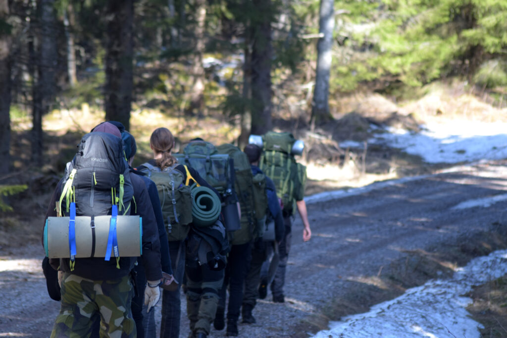 Nordic Resistance Movement members hiking in Swedish forest, Dalarna