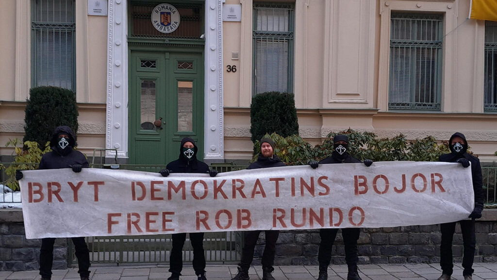 Nordic Resistance Movement Rob Rundo banner action, Stockholm